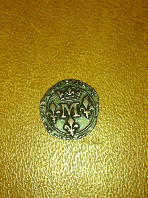 Photo 2 Pièce de monnaie non identifiée: moneda recortada