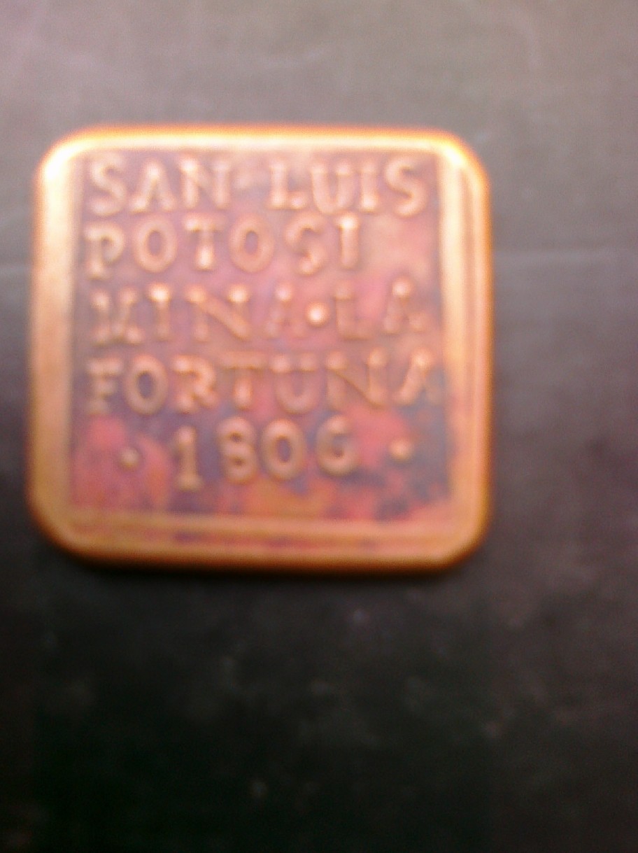 Photo 2 Pièce de monnaie non identifiée: Es una Moneda o que Es?