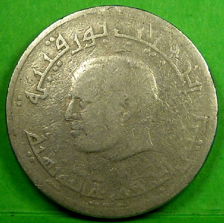 Photo 1 Pièce de monnaie non identifiée: Moneda gastada para identicar
