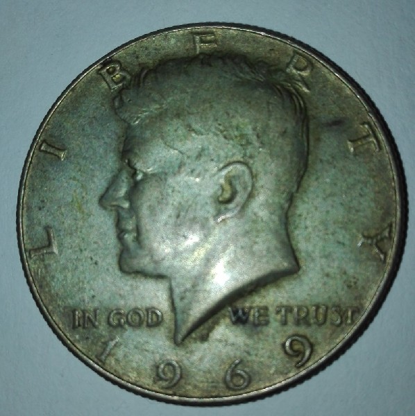 Photo 1 Pièce de monnaie non identifiée: 1/2 dolar