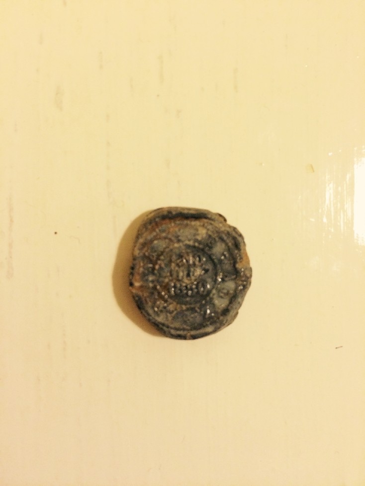 Photo 2 Pièce de monnaie non identifiée: moneda creo que de plomo