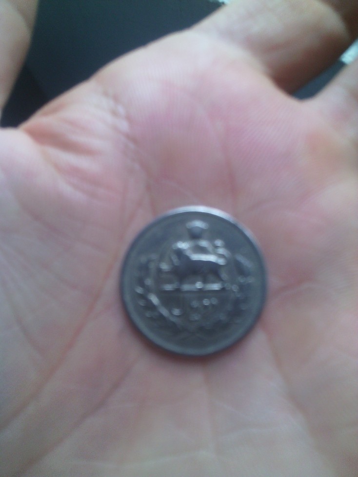 Photo 2 Pièce de monnaie non identifiée: de que pais es esta moneda