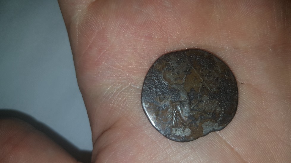 Photo 2 Pièce de monnaie non identifiée: alguien me puede ayudar con esta moneda? no se de donde es ni si pudiera tener valor