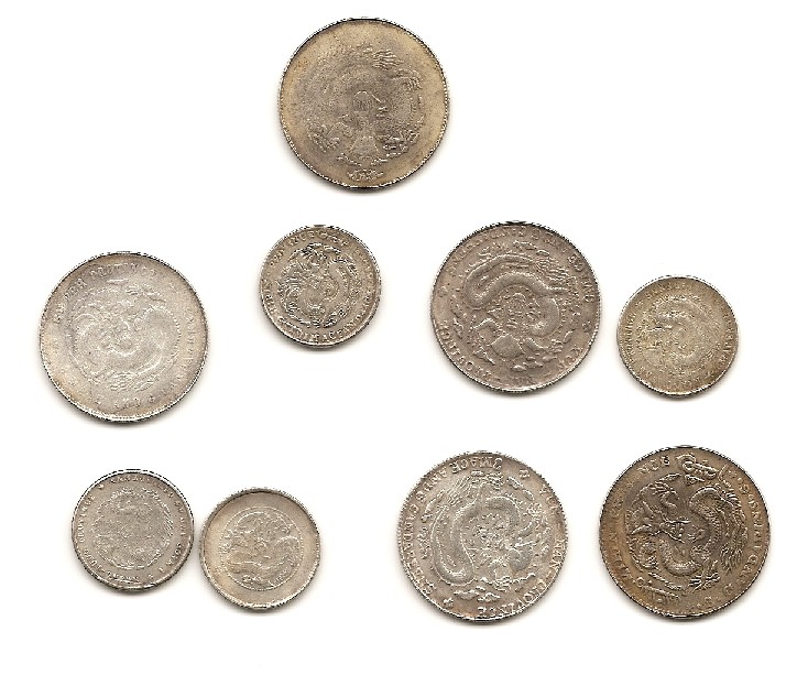 Photo 2 Pièce de monnaie non identifiée: CHINAS 50 CENTIMOS Y 20 CENTIMOS