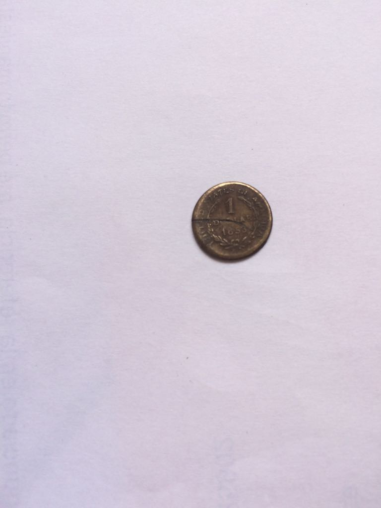 Photo 2 Pièce de monnaie non identifiée: modenas