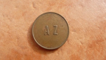Photo 2 Pièce de monnaie non identifiée: Ficha a identificar