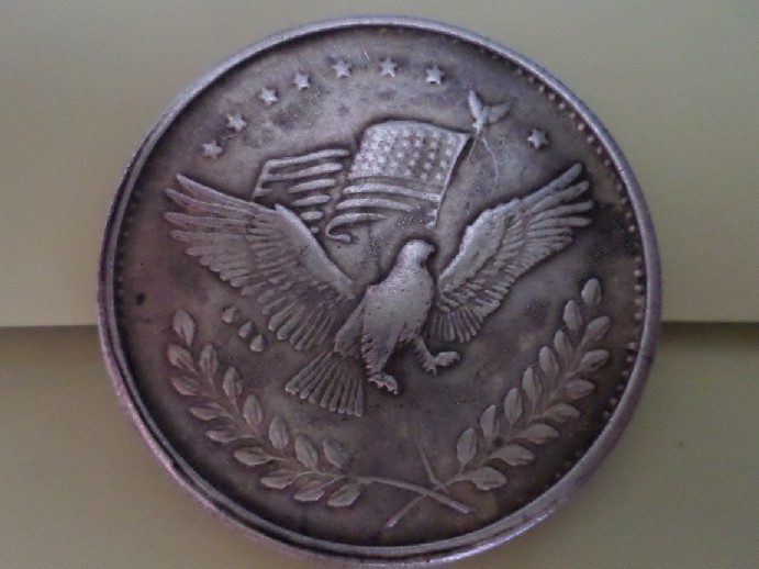 Photo 2 Pièce de monnaie non identifiée: dolar americano de plata