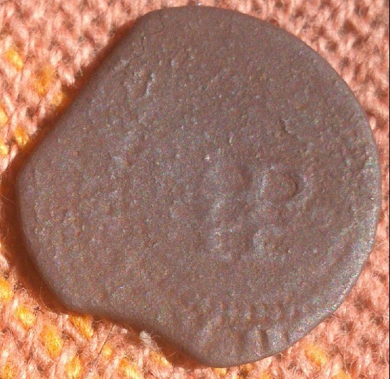 Photo 2 Pièce de monnaie non identifiée: quen ayuda??