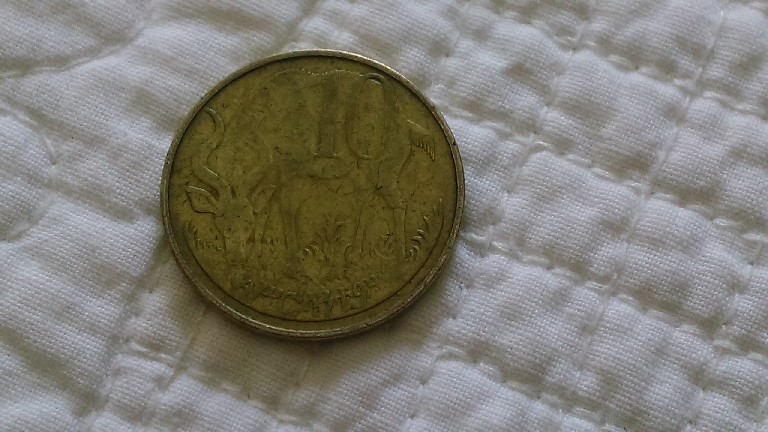 Photo 1 Pièce de monnaie non identifiée: valor 10