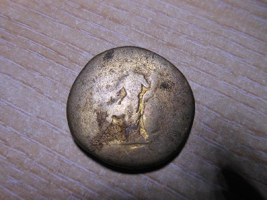 Photo 2 Pièce de monnaie non identifiée: Algun dato sobre esta moneda. Gracias
