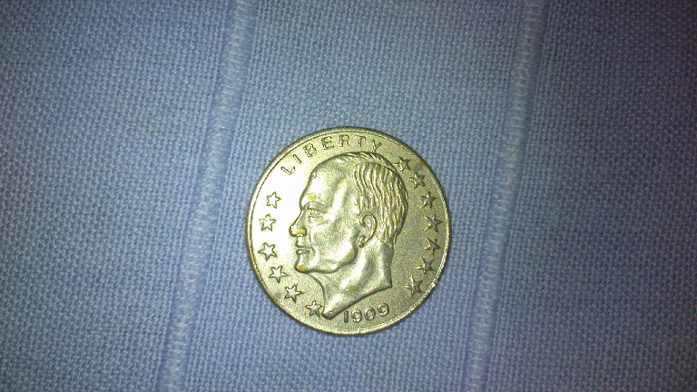 Photo 2 Pièce de monnaie non identifiée: EEUU 5 Dolares de 1909