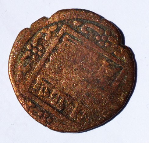 Photo 1 Pièce de monnaie non identifiée: moneda mordisqueada