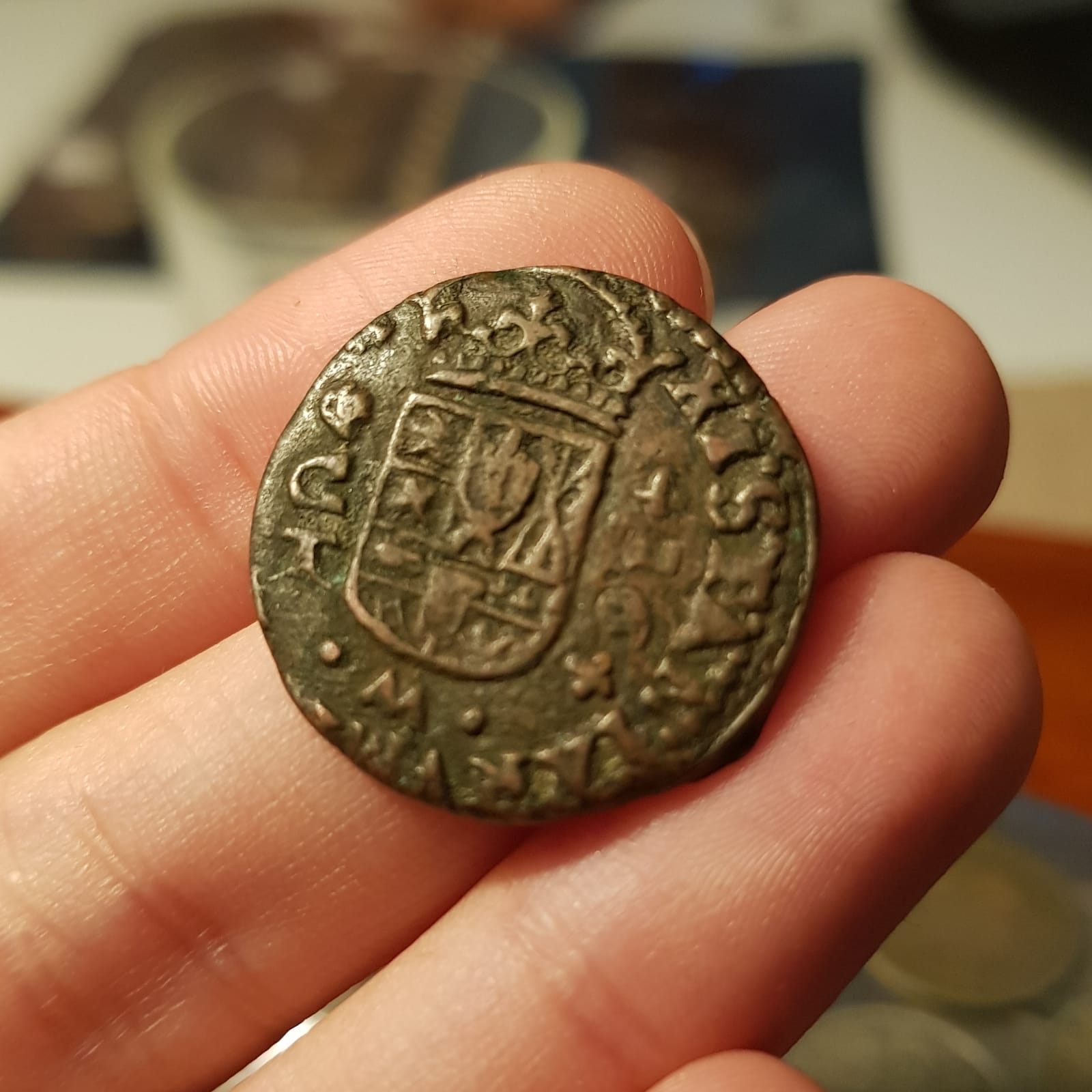 Photo 2 Pièce de monnaie non identifiée: Por favor, ¿Alguien puede ayudarme a identificar esta moneda?