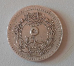 Photo 1 Pièce de monnaie non identifiée: moneda árabe de 5??? 