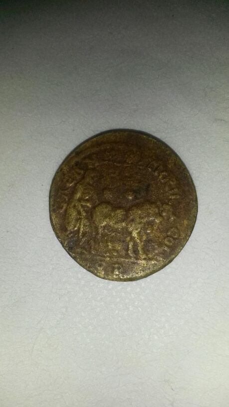 Photo 1 Pièce de monnaie non identifiée: Tengo mucha curiosidad porfavor ayundenme 
