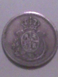 Photo 2 Pièce de monnaie non identifiée: TANTO y 10 TANTO