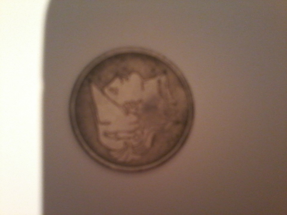 Photo 1 Pièce de monnaie non identifiée: Hola, tengo una duada es una monedas es por ambos lados igual