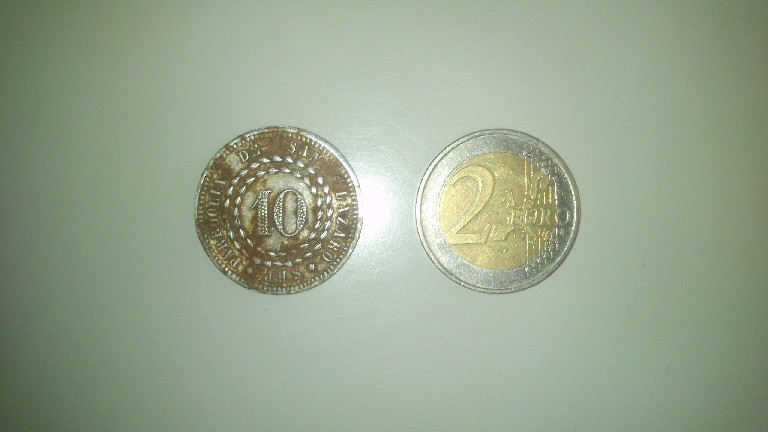 Photo 1 Pièce de monnaie non identifiée: Moneda???????????