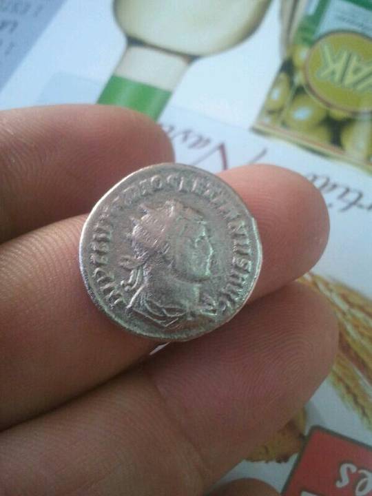 Photo 2 Pièce de monnaie non identifiée: moneda de plata extranjera