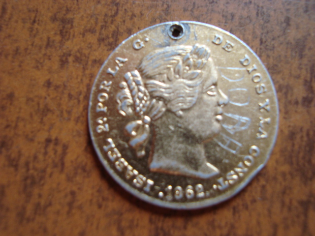 Photo 1 Pièce de monnaie non identifiée: es una moneda? 