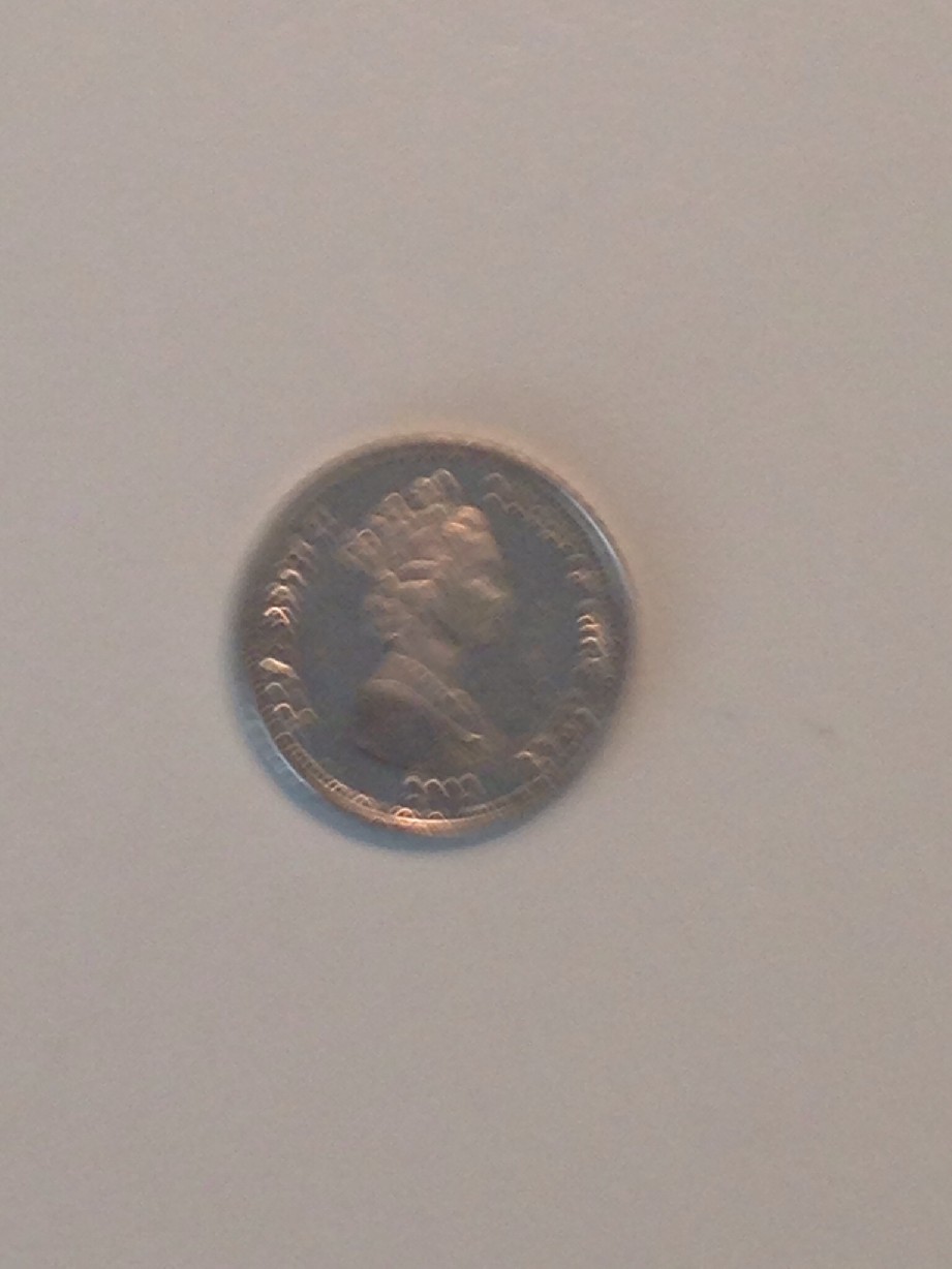 Photo 1 Pièce de monnaie non identifiée: 5 pence