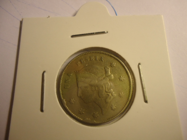 Photo 1 Pièce de monnaie non identifiée: alguien me ayuda.