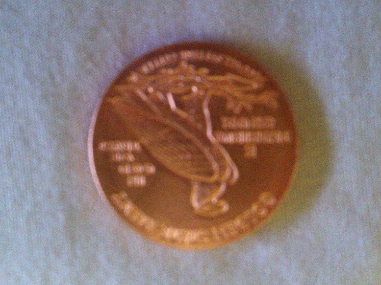 Photo 2 Pièce de monnaie non identifiée: Moneda de coleccion de cobre